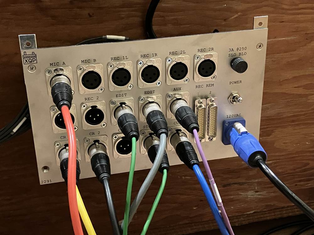 The XQP BC22 jack panel is temporarily attached to an old box on which the console is currently sitting.